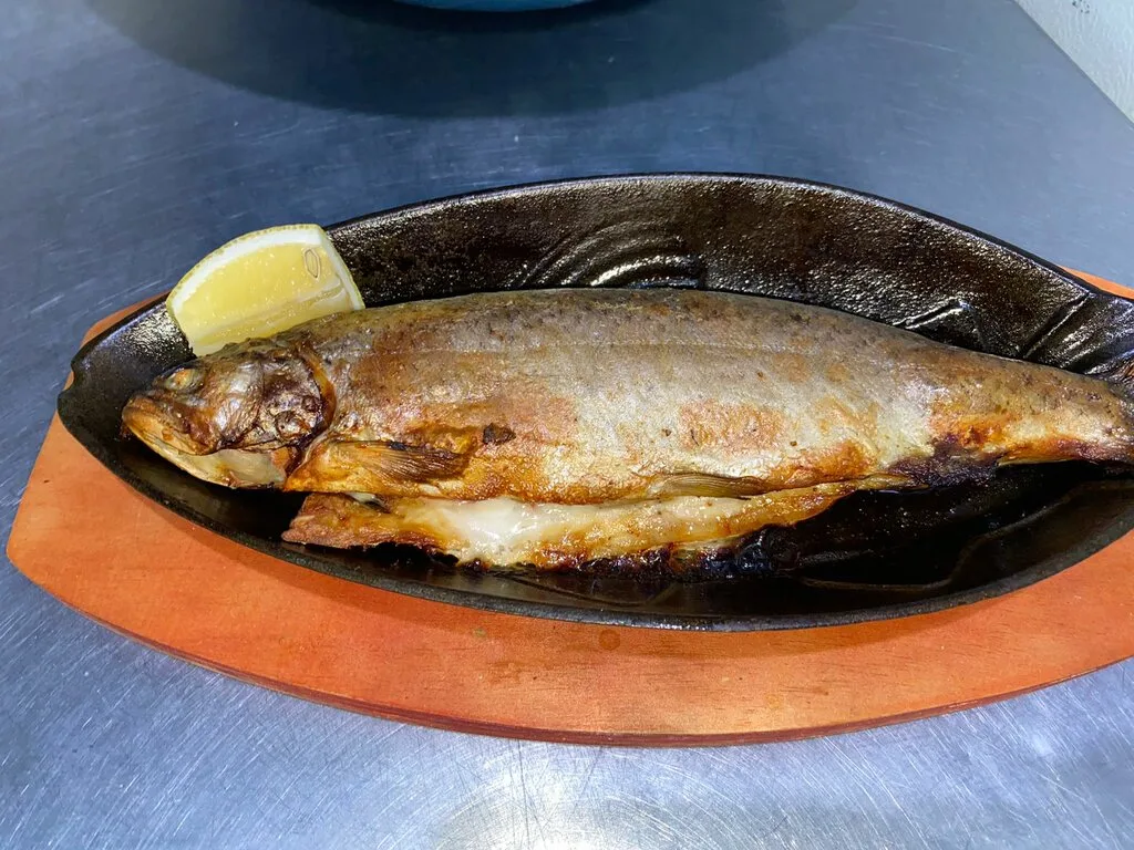 Форель запеченная с овощами(за 100гр)