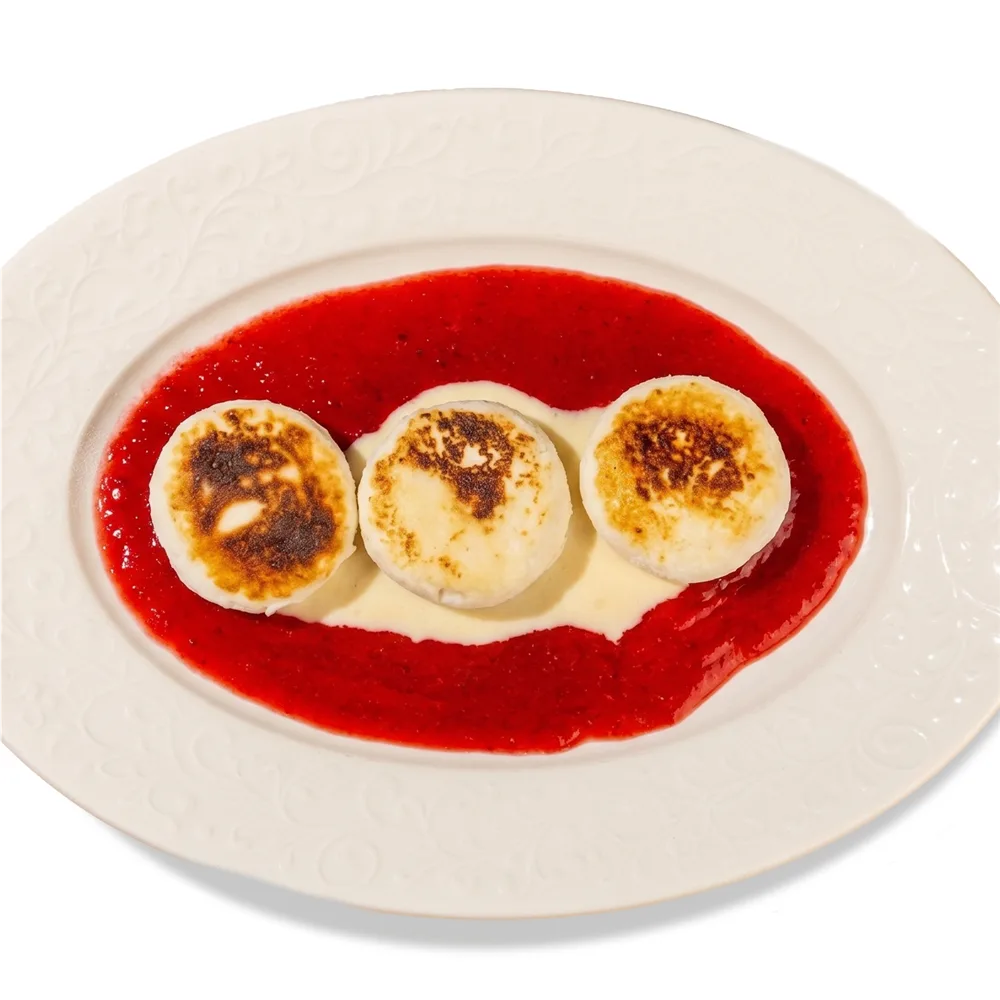 Сырники с малиной и заварным кремом