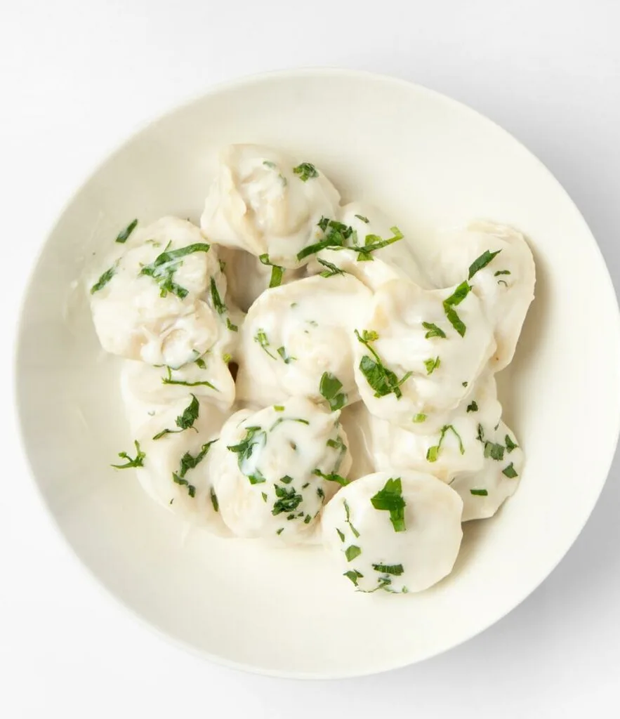 Пельмени куриные в сливочном соусе